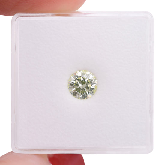 0.68 Carat Fancy Light Yellow Green Round Brilliant Diamond I1 GIA