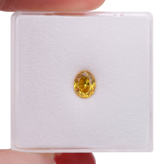 0.53 Carat Fancy Vivid Orangy Yellow Oval Diamond SI1 GIA