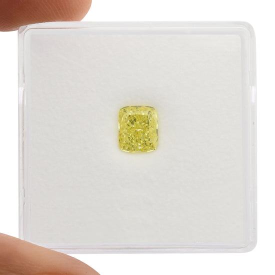 0.70 Carat Fancy Intense Yellow Cushion Diamond VVS1 GIA