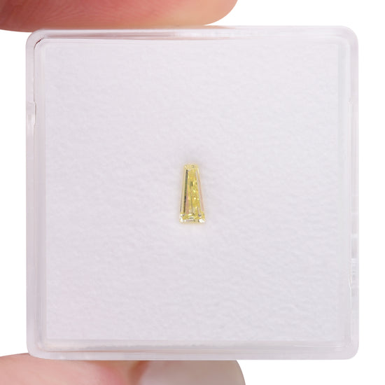 0.12 Carat Fancy Yellow Taper Diamond VS2