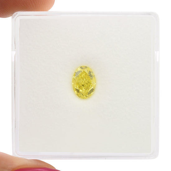 0.72 Carat Fancy Intense Yellow Oval Diamond VS1 GIA