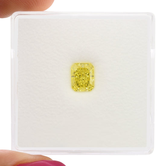 0.70 Carat Fancy Intense Yellow Radiant Diamond VVS2 GIA