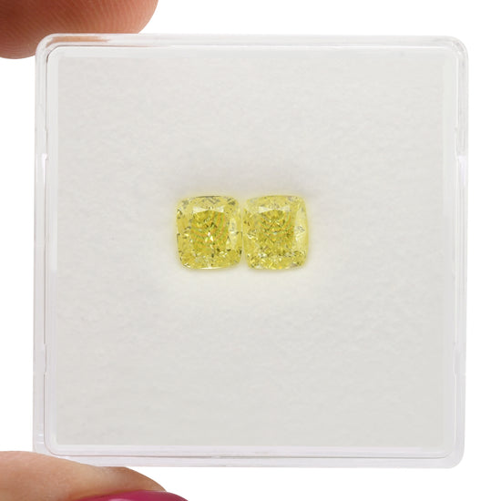 1.09 Carat Fancy Yellow Cushion Diamonds VVS1