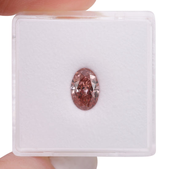 1,01 Karat Fancy Intense Orangy Pink Oval-Diamant SI2 GIA
