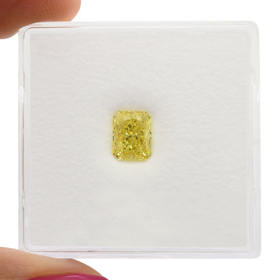 0.76 Carat Fancy Intense Yellow Radiant Diamond VVS1 GIA