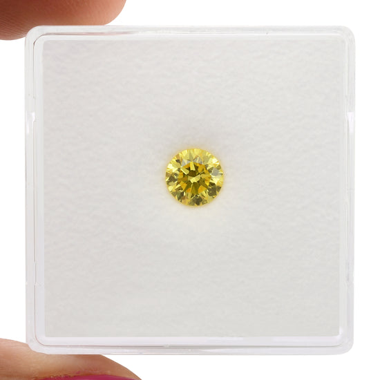 0.47 Carat Fancy Vivid Yellow Round Brilliant Diamond VS2 GIA