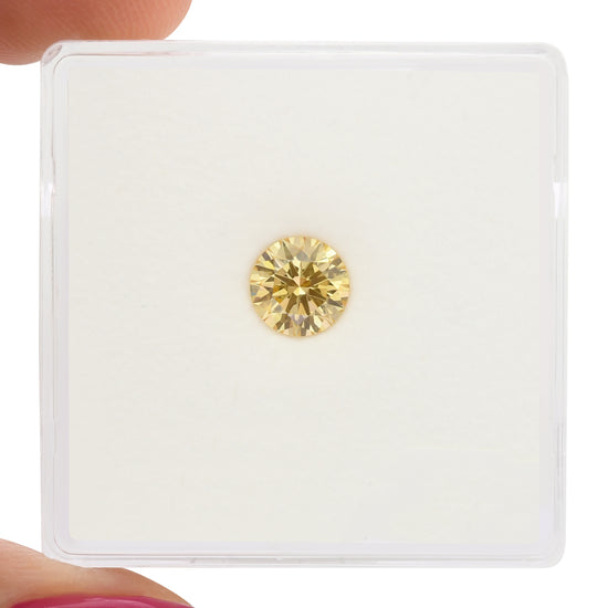 0.55 Carat Fancy Orange Yellow Round Brilliant Diamond VS2 GIA