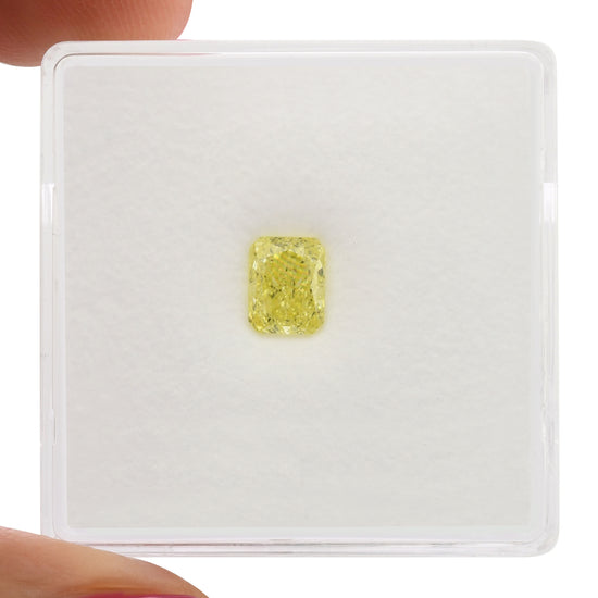 0.63 Carat Fancy Intense Yellow Radiant Diamond VVS1 GIA
