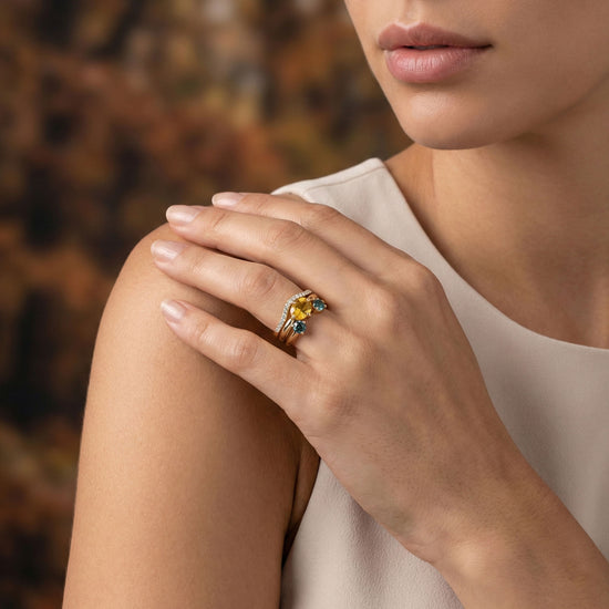 Green Trillion Tourmaline, Teal Round Sapphire, and Diamond Trio Rings