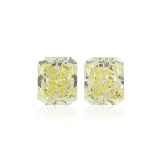 7.23 Carat Fancy Yellow Radiant Diamonds VVS2 GIA Pair