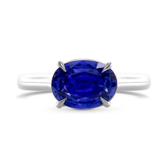 Oval Blue Sapphire and Diamond Hidden Halo Ring