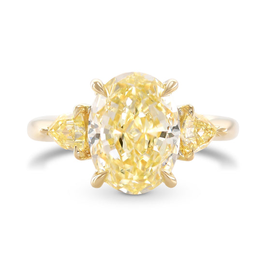 Light Yellow Oval Diamond Three-stone Ring