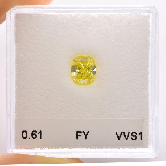 0.61 Carat Fancy Yellow Cushion Diamond VVS1 GIA