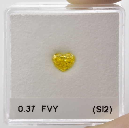 0.37 Carat Fancy Vivid Yellow HEART Diamond (SI2) GIA