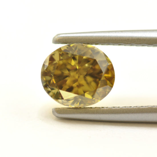 0.76 Carat Fancy Deep Brownish Greenish Yellow Oval Diamond (SI1) GIA