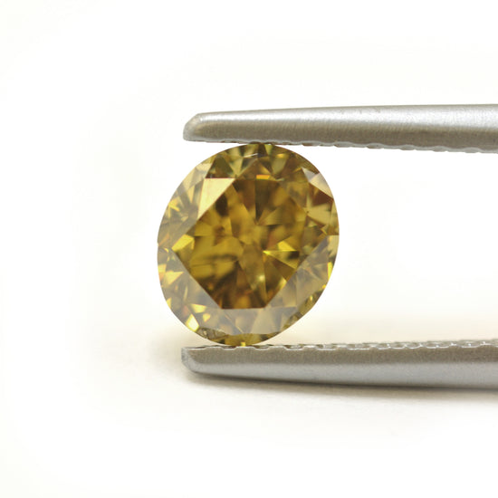 0.76 Carat Fancy Deep Brownish Greenish Yellow Oval Diamond (SI1) GIA
