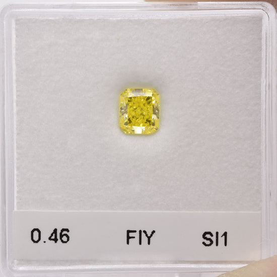 0.46 Carat Fancy Intense Yellow Radiant Diamond SI1 GIA