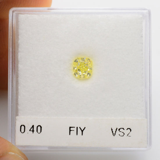 0.40 Carat Fancy Intense Yellow Radiant Diamond VS2 IGI