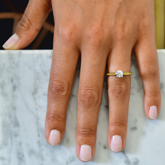 White F Colored Brilliant Cut Diamond Side-stone Ring
