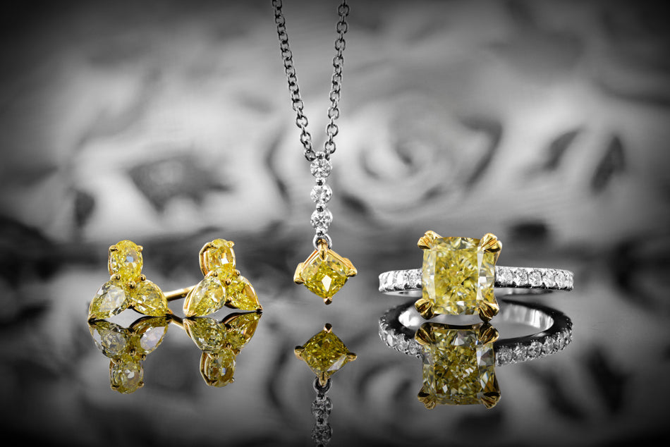  Fancy Intense Yellow Cushion Diamond Side stone Ring