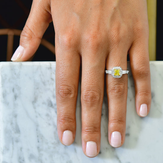 Fancy Vivid Yellow Diamond Halo and Side-stone Ring