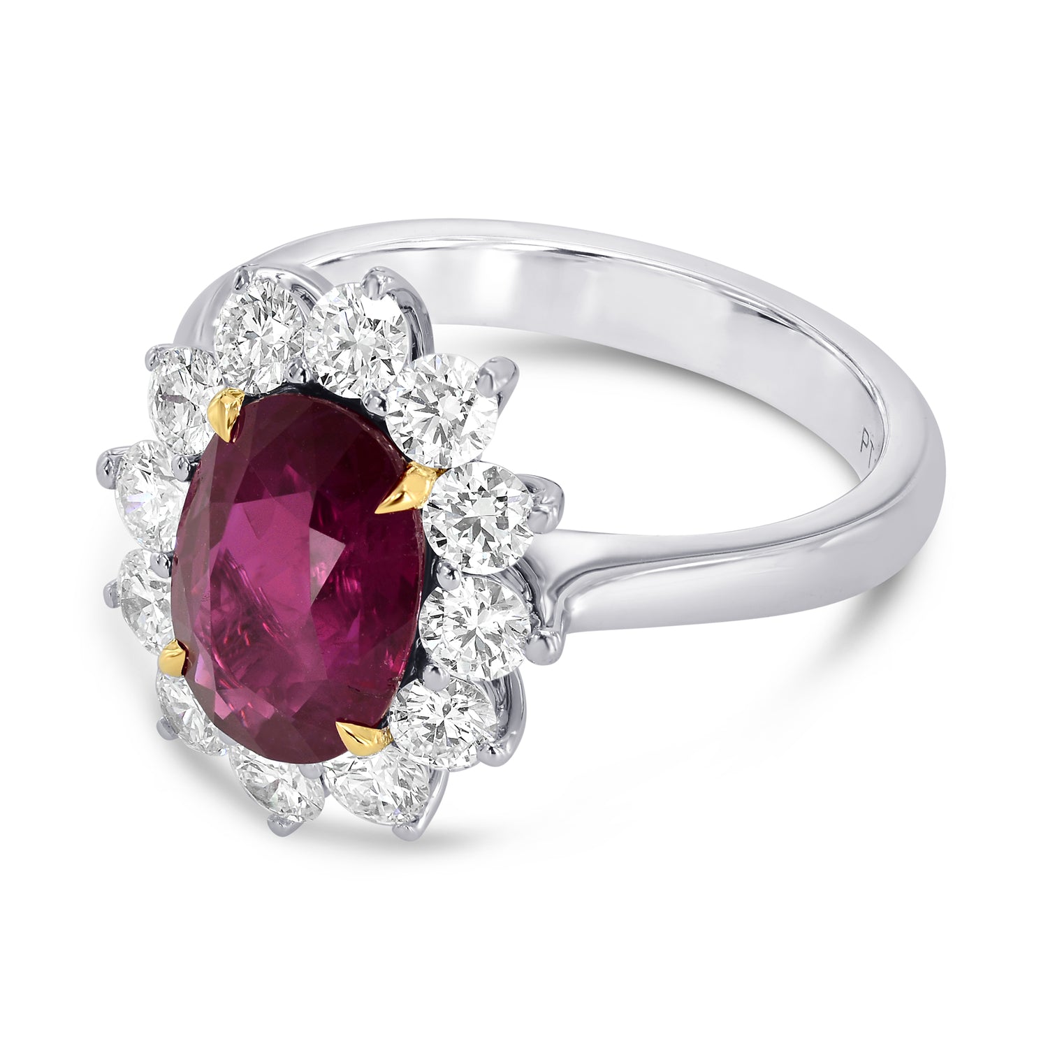 Platinum Oval Ruby and Diamond Basket Halo Ring