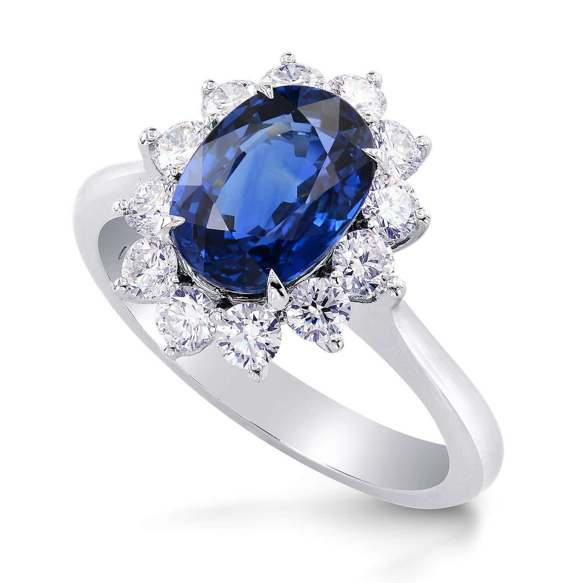 Platinum Oval Sapphire and Diamond Basket Halo Ring