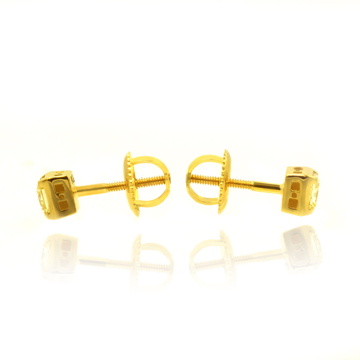 Fancy Yellow Diamond Radiant Ear studs in 18K
