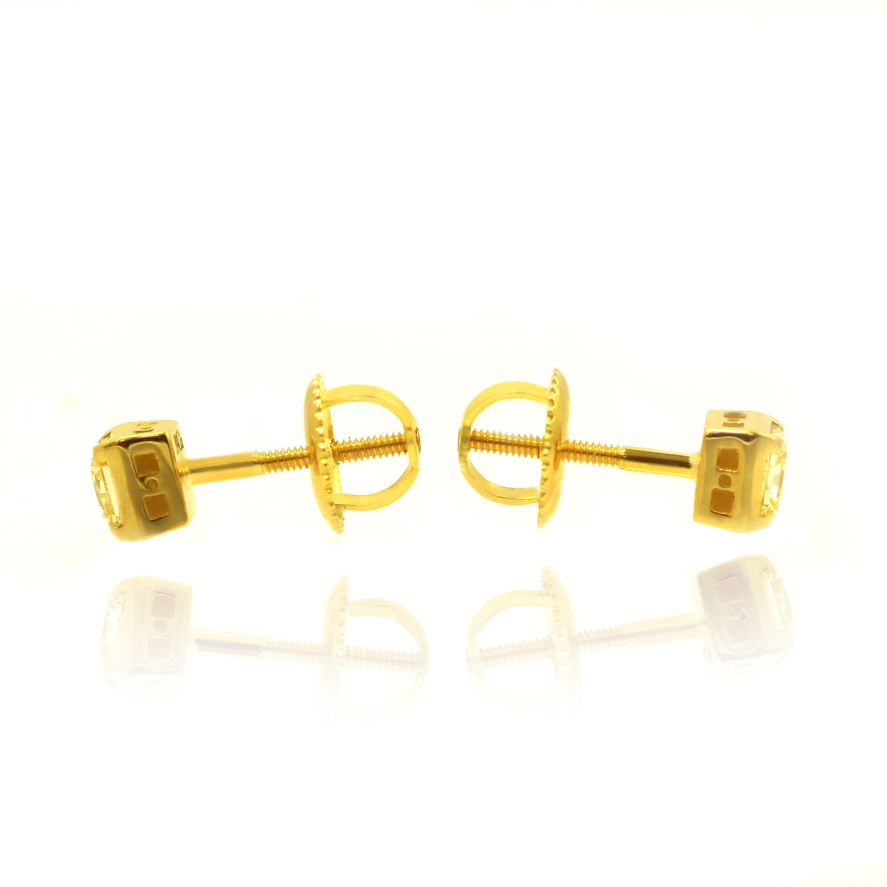 Fancy Yellow Diamond Radiant Ear studs in 18K