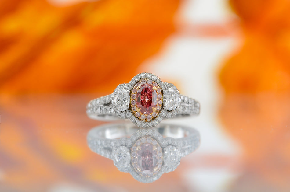 Argyle Fancy Intense Pink Oval Diamond 3 Stone Halo Ring