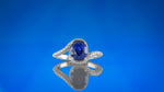 Oval Sapphire & Diamond Cross-over Halo Ring