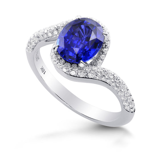 Oval Sapphire & Diamond Cross-over Halo Ring