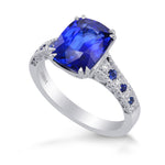 Vivid Blue Cushion Sapphire & Diamond Side stone Ring