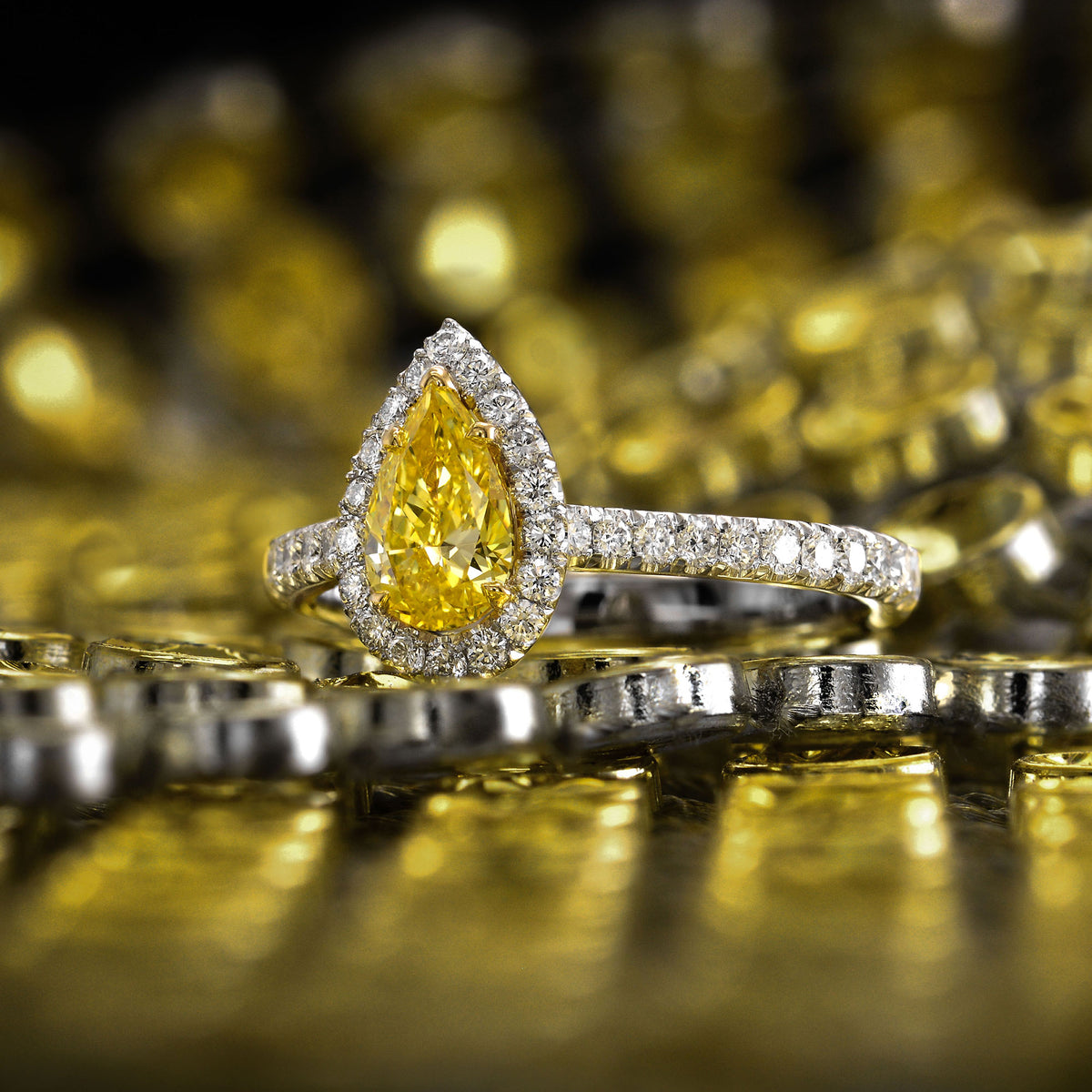 Fancy Vivid Yellow Pear Diamond Halo Ring
