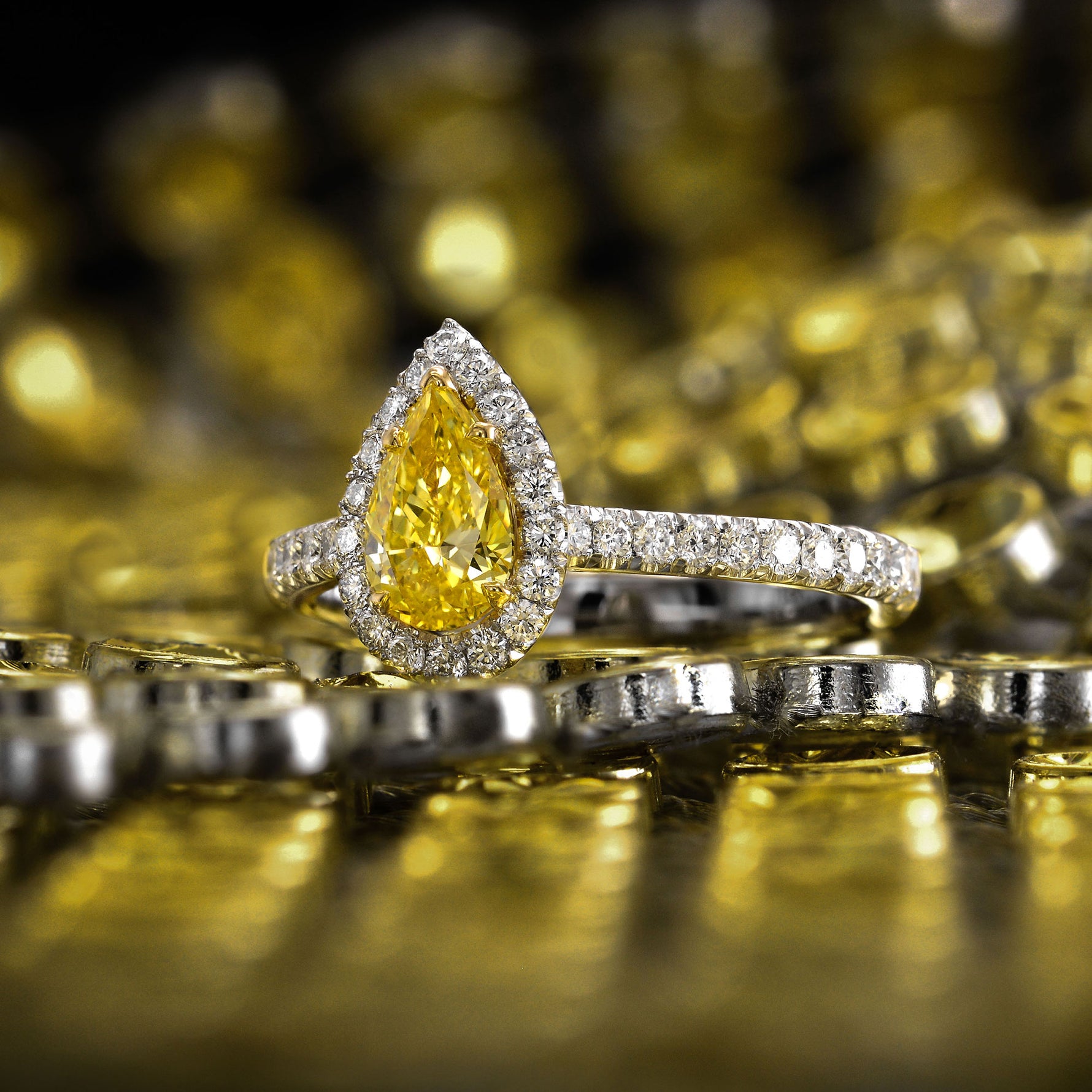 Fancy Vivid Yellow Pear Diamond Halo Ring
