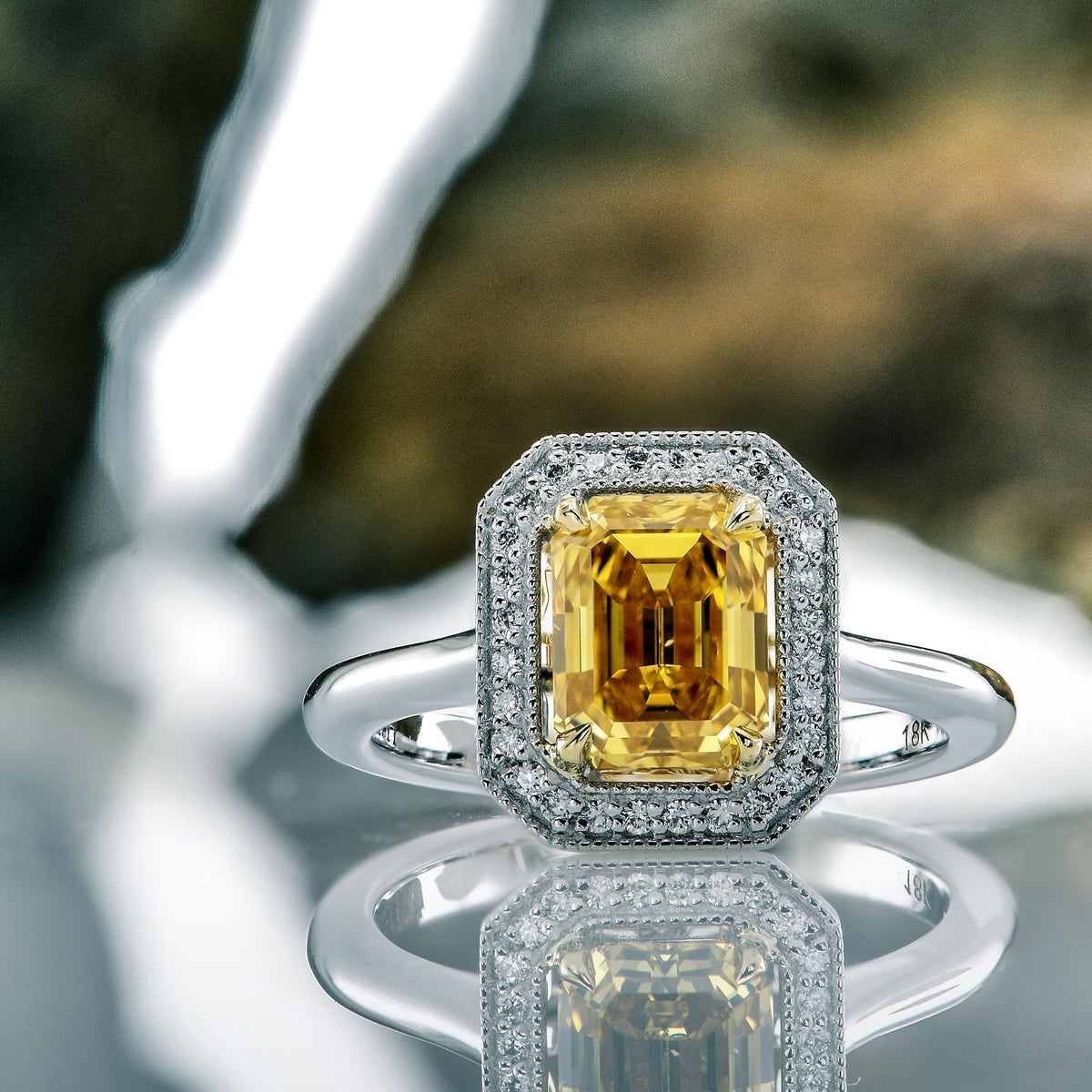Fancy Deep Orangy Yellow Emerald Diamond Halo Ring