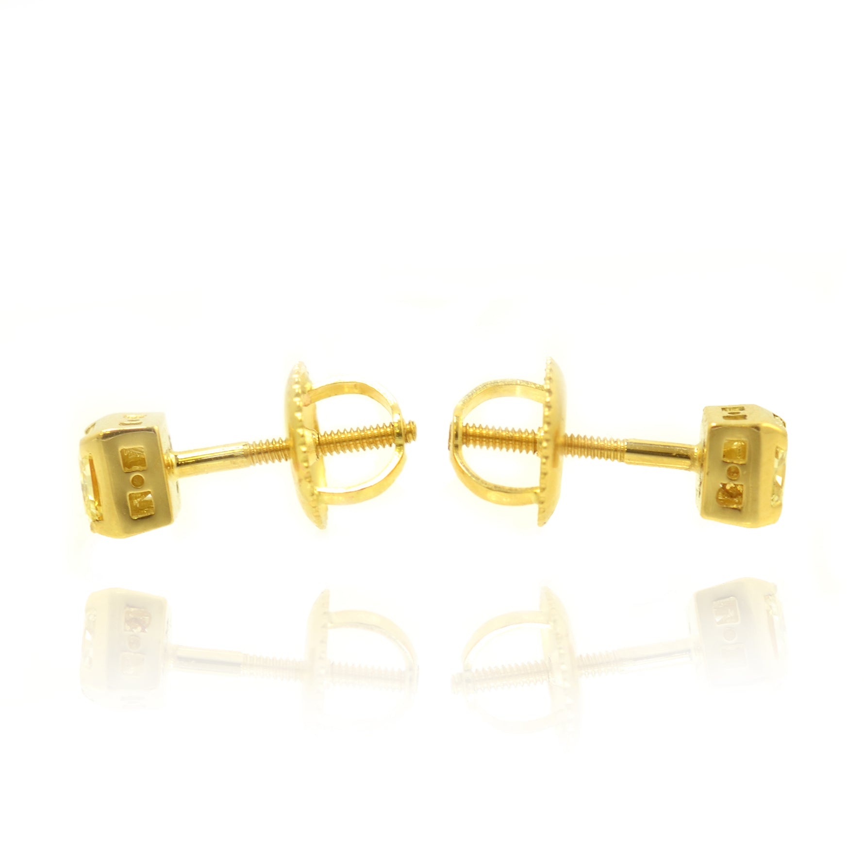 Fancy Yellow  Radiant  Diamond Stud Earrings set in 18K Gold