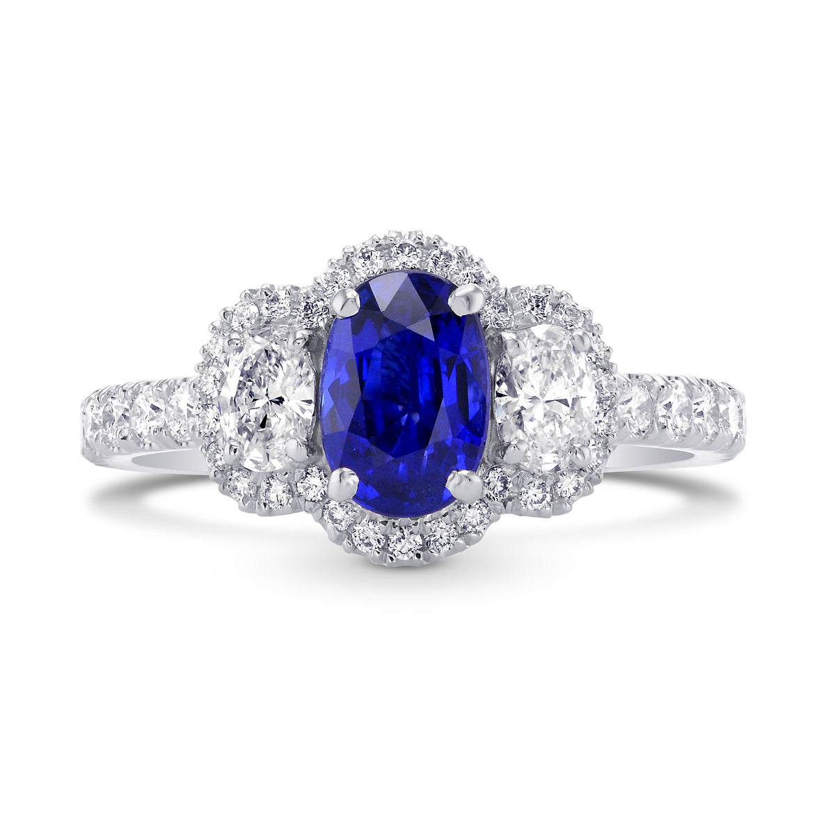  Oval Blue Sapphire and Diamond Side Stone Ring