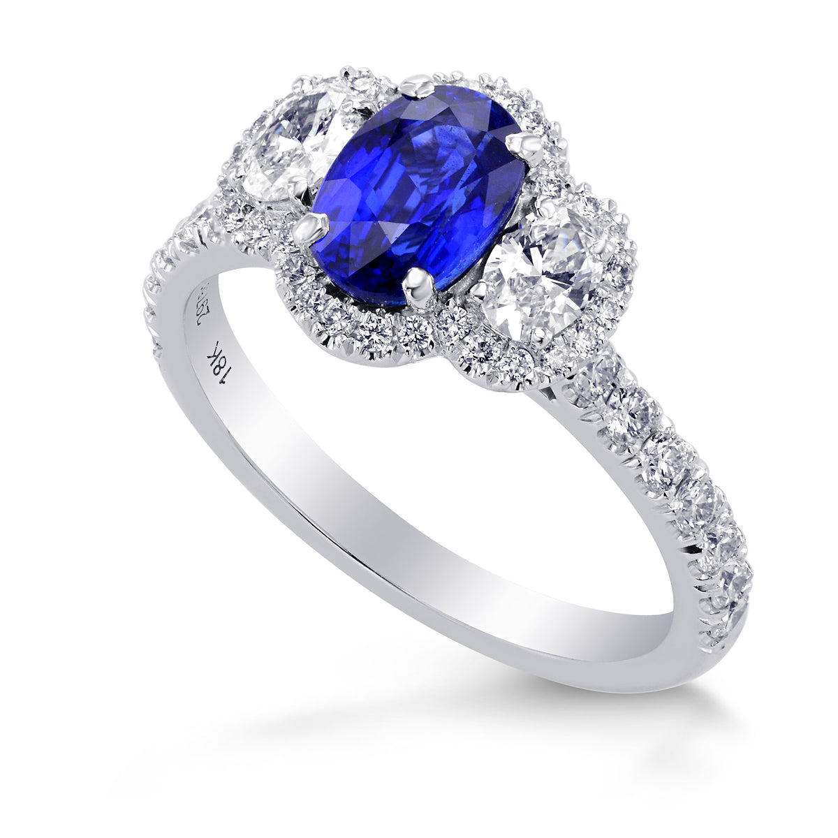  Oval Blue Sapphire and Diamond Side Stone Ring