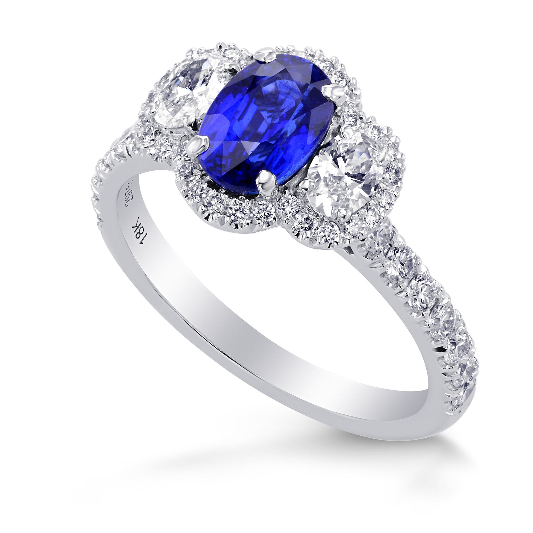  Oval Blue Sapphire and Diamond Side Stone Ring