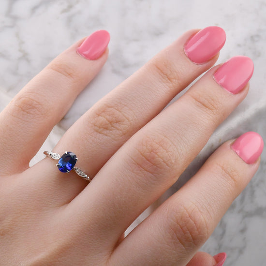 Blue Sapphire and Diamond  Oval Side Stones Ring