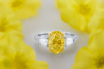 Fancy Intense Yellow Oval & Taper 3 Stone Diamond Ring 
