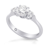 Colorless XXX Round Brilliant 3 Stone Diamond Ring