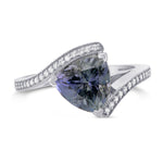 Blue Trilliant Tanzanite & Diamond Cross Over Ring
