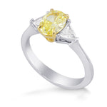 Fancy Light Yellow Oval & Triangle Side Stone Diamond Ring
