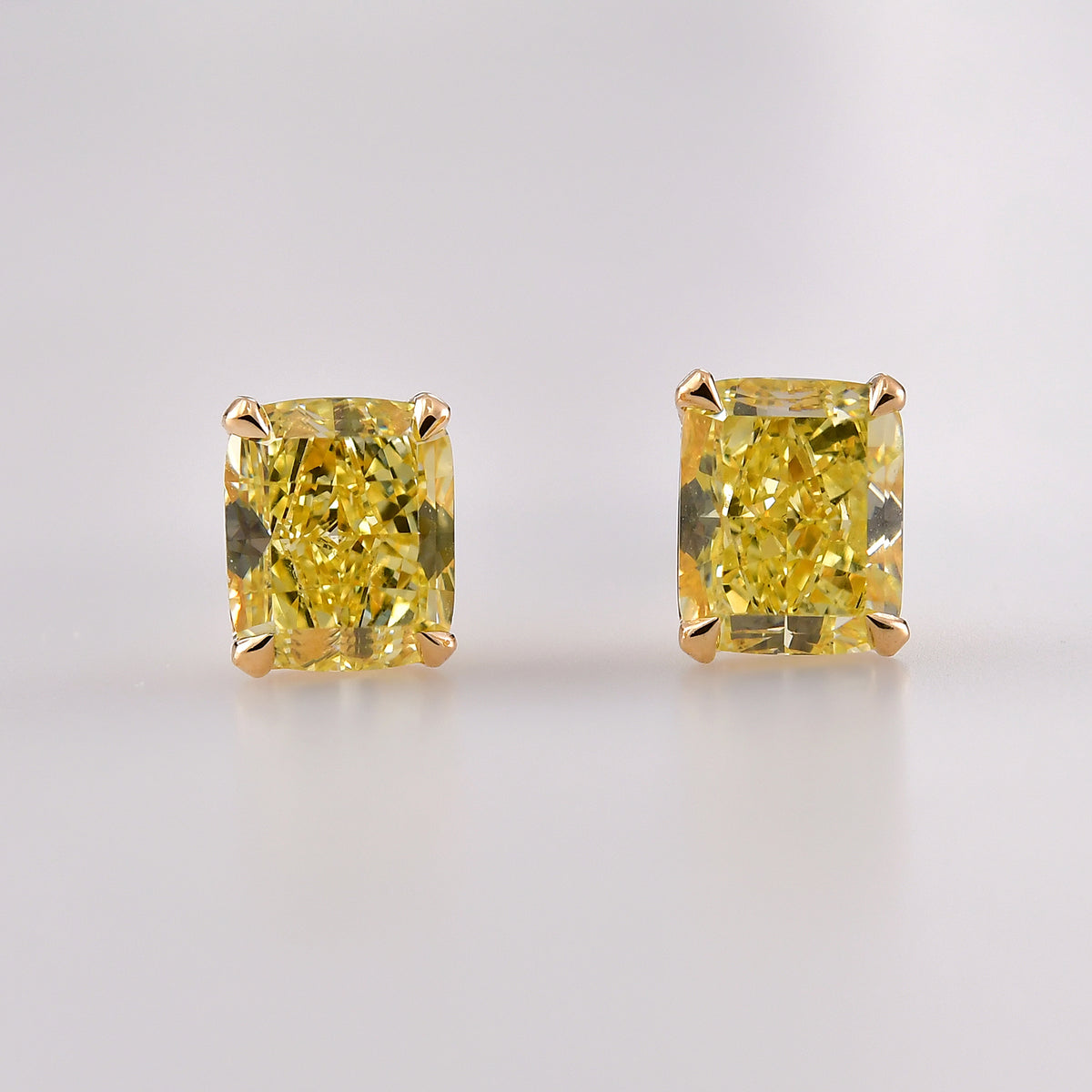 Fancy Yellow Cushion Diamond Stud Earrings