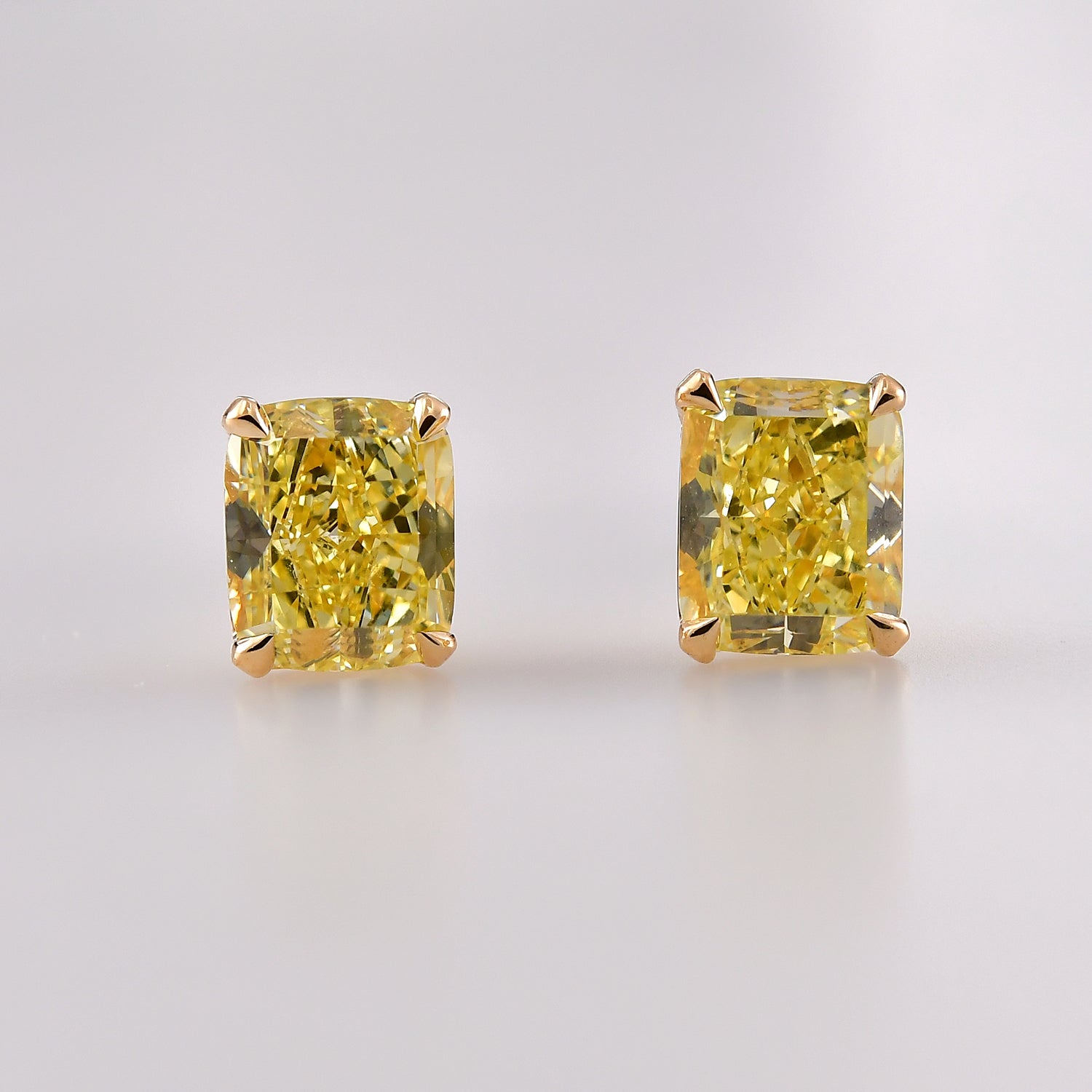 Fancy Yellow Cushion Diamond Stud Earrings