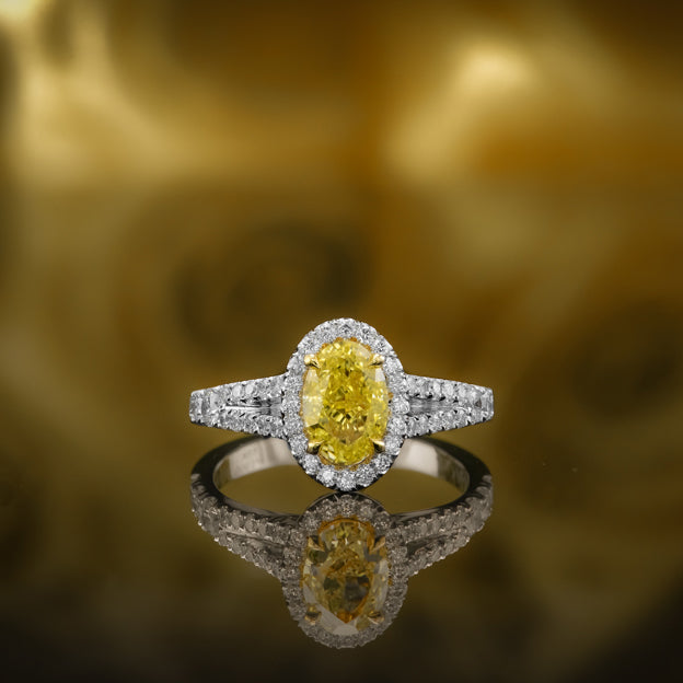 Fancy Intense Yellow Oval Halo Diamond Ring