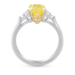 Fancy Yellow Pear Side Stone Diamond ring 