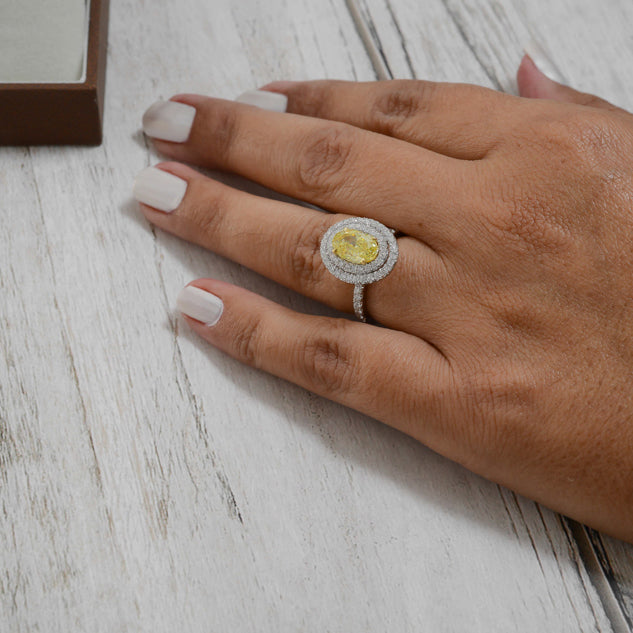 Fancy Intense Yellow Oval Diamond Double Halo Ring